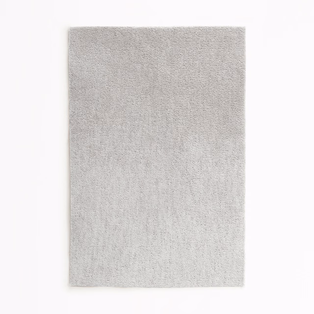 Pale silver-grey velvet swatch showing a fine, softly mottled nap