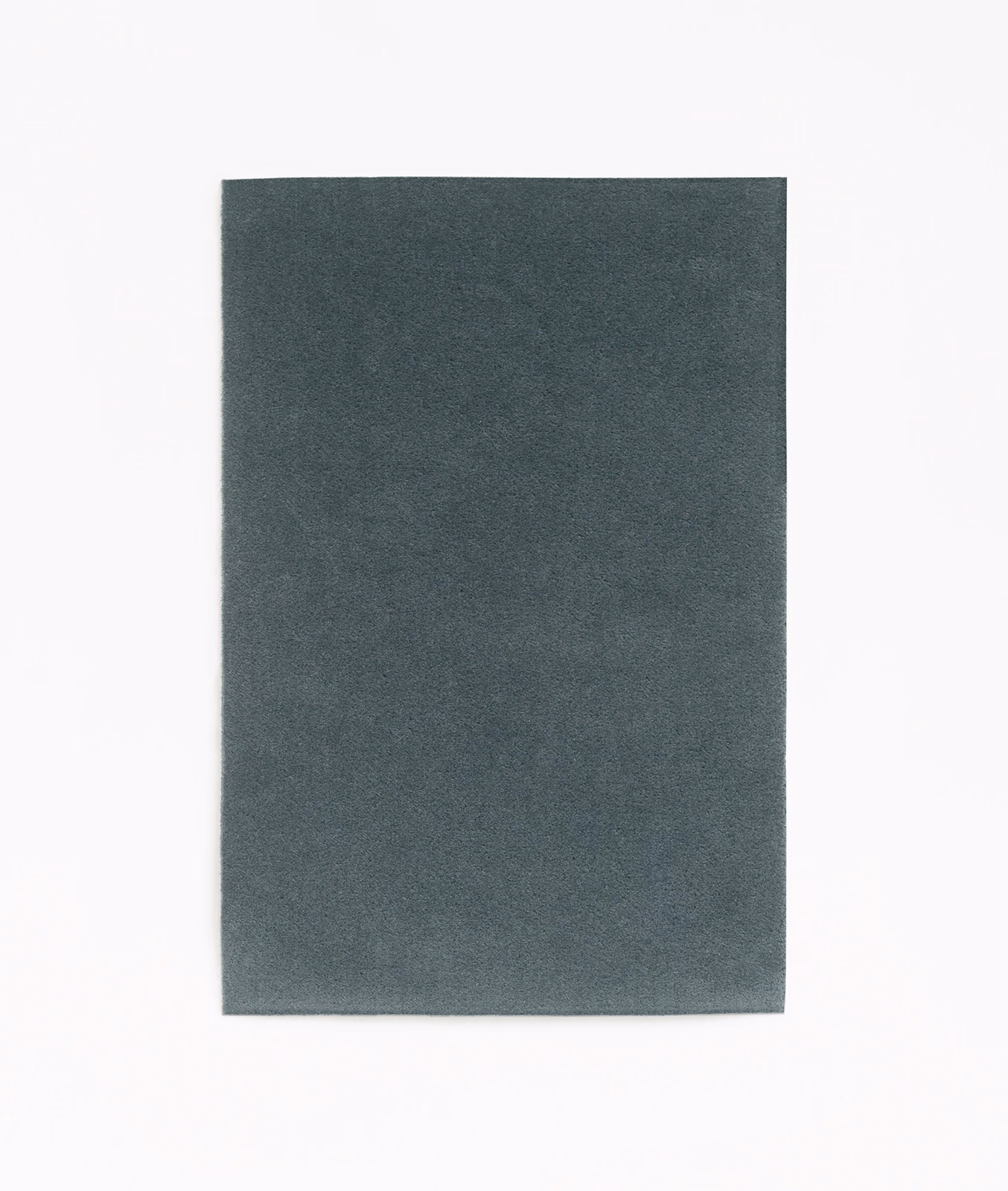 Deep storm-blue velvet swatch with a subtly brushed, low-lustre surface.