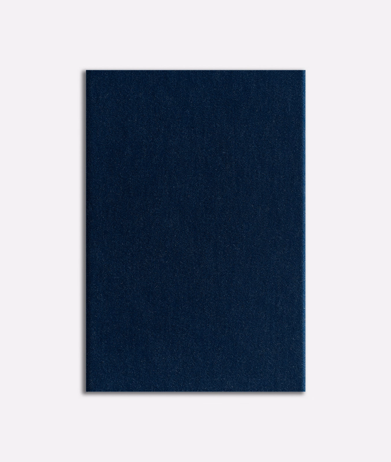Deep Prussian-blue velvet swatch with subtle vertical nap and ink-dark shading