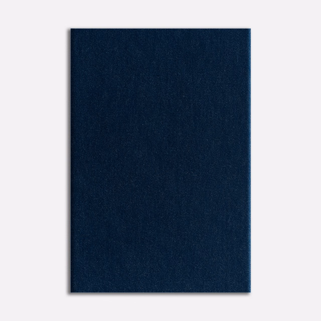 Deep Prussian-blue velvet swatch with subtle vertical nap and ink-dark shading