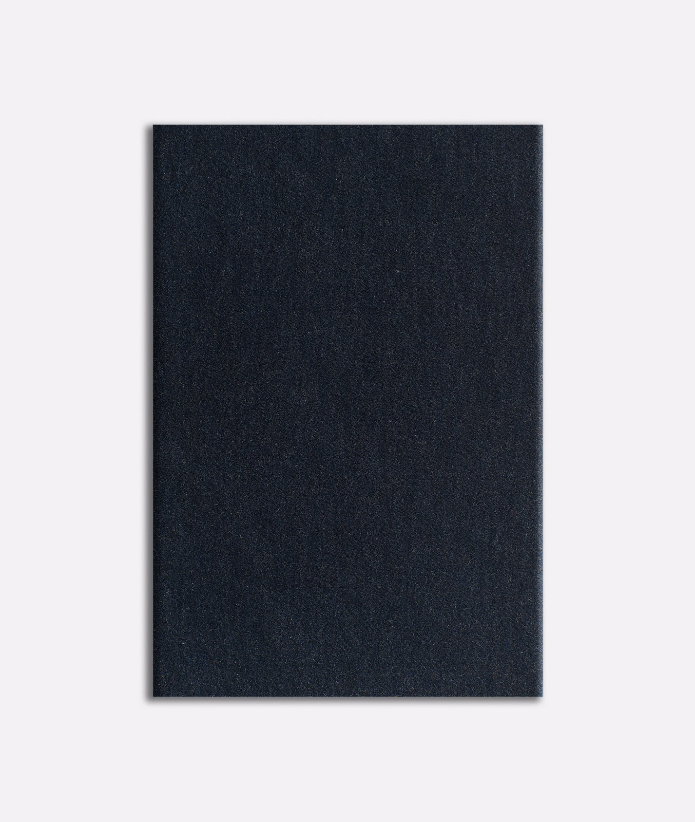 Deep blue-black velvet swatch with a softly directional nap and near-black shading