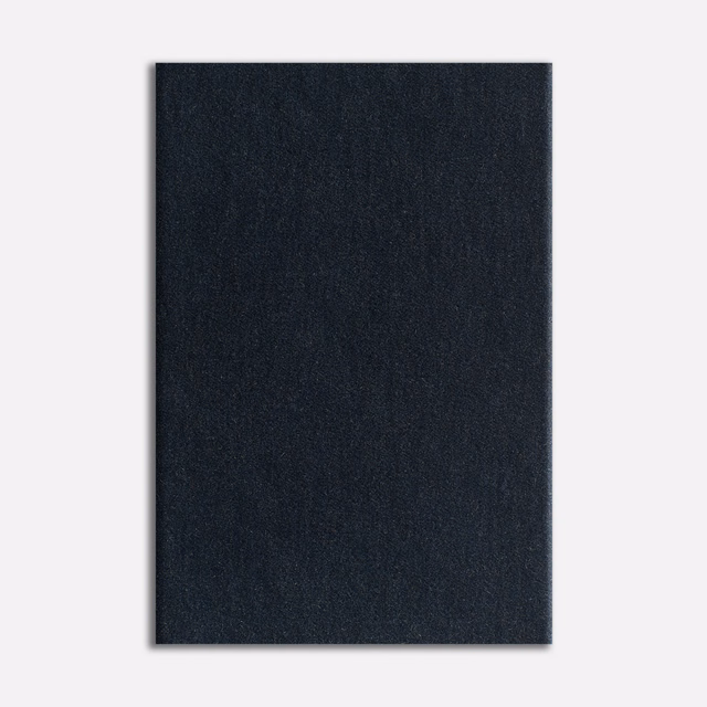 Deep blue-black velvet swatch with a softly directional nap and near-black shading