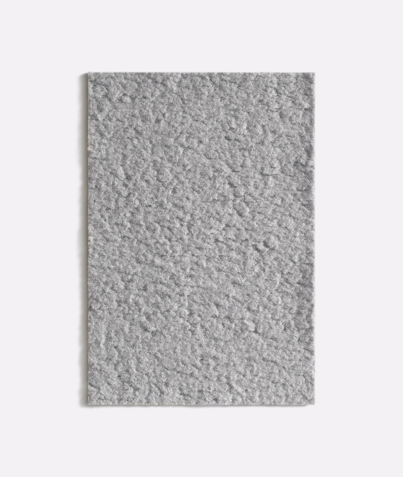 Pale koala-grey velvet swatch showing a softly mottled, tactile pile