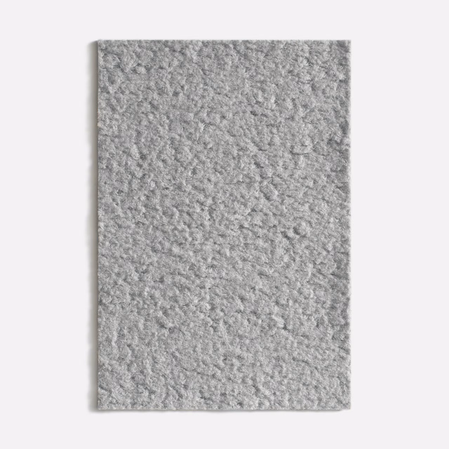 Pale koala-grey velvet swatch showing a softly mottled, tactile pile