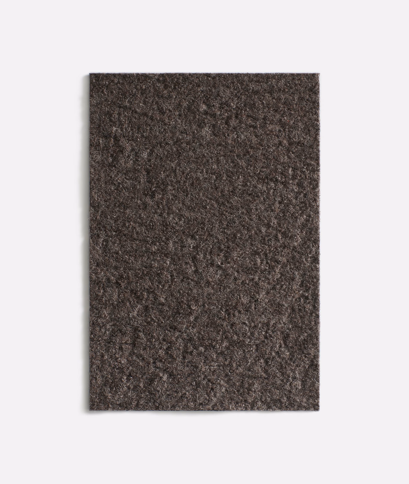 Dark brown velvet swatch with charcoal mottling and a softly textured pile