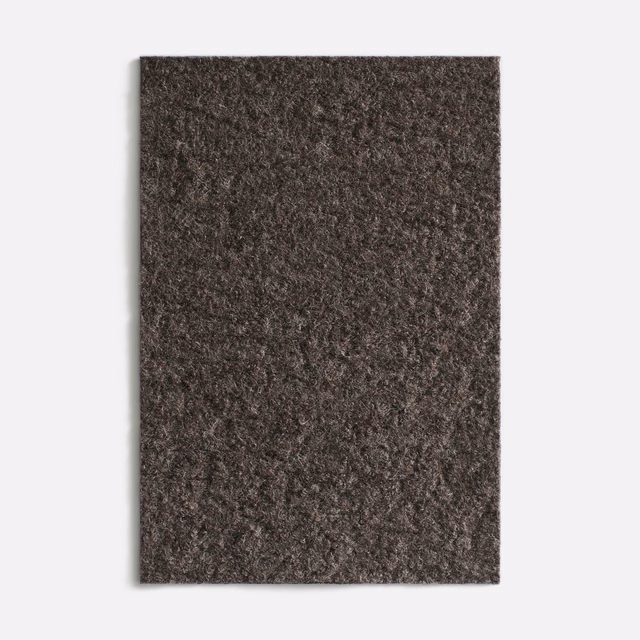 Dark brown velvet swatch with charcoal mottling and a softly textured pile