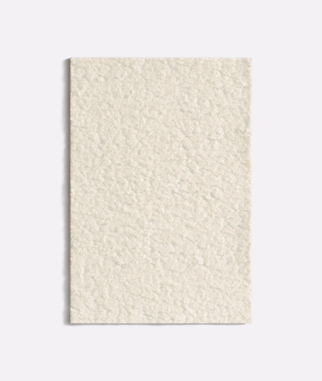 Pale ivory velvet swatch with a softly napped, fleece-like textured surface