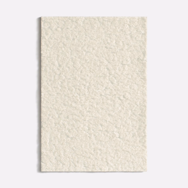 Pale ivory velvet swatch with a softly napped, fleece-like textured surface