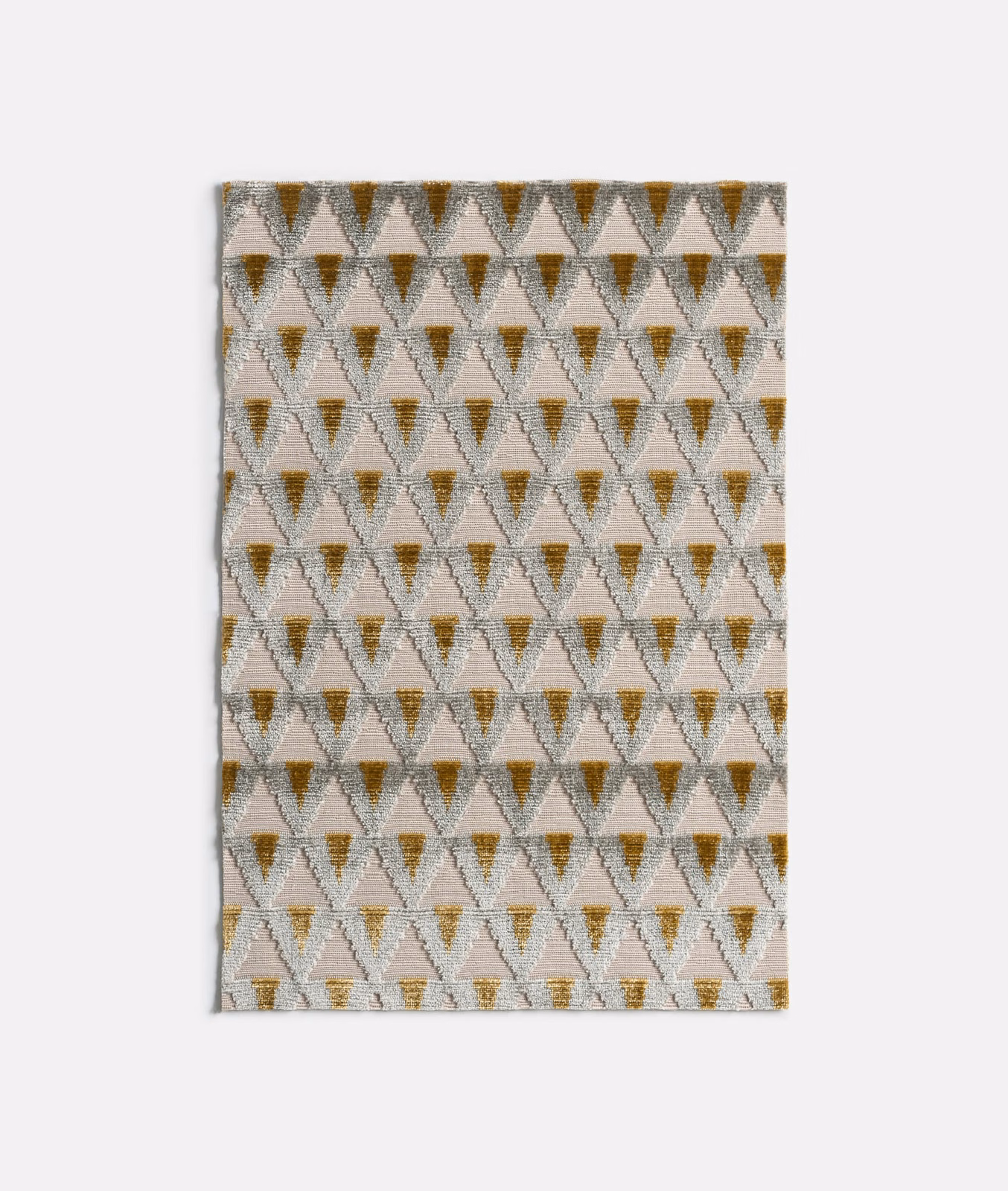 Ivory velvet with repeating ochre and taupe geometric diamond motifs