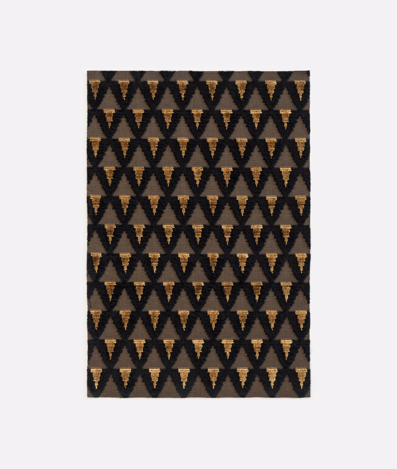 Charcoal velvet with repeating warm ochre downward-pointing triangles in neat rows