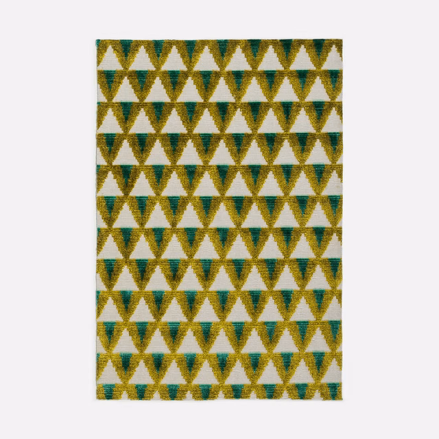 Emerald and gold triangle velvet with ivory geometric gaps and softly textured surface