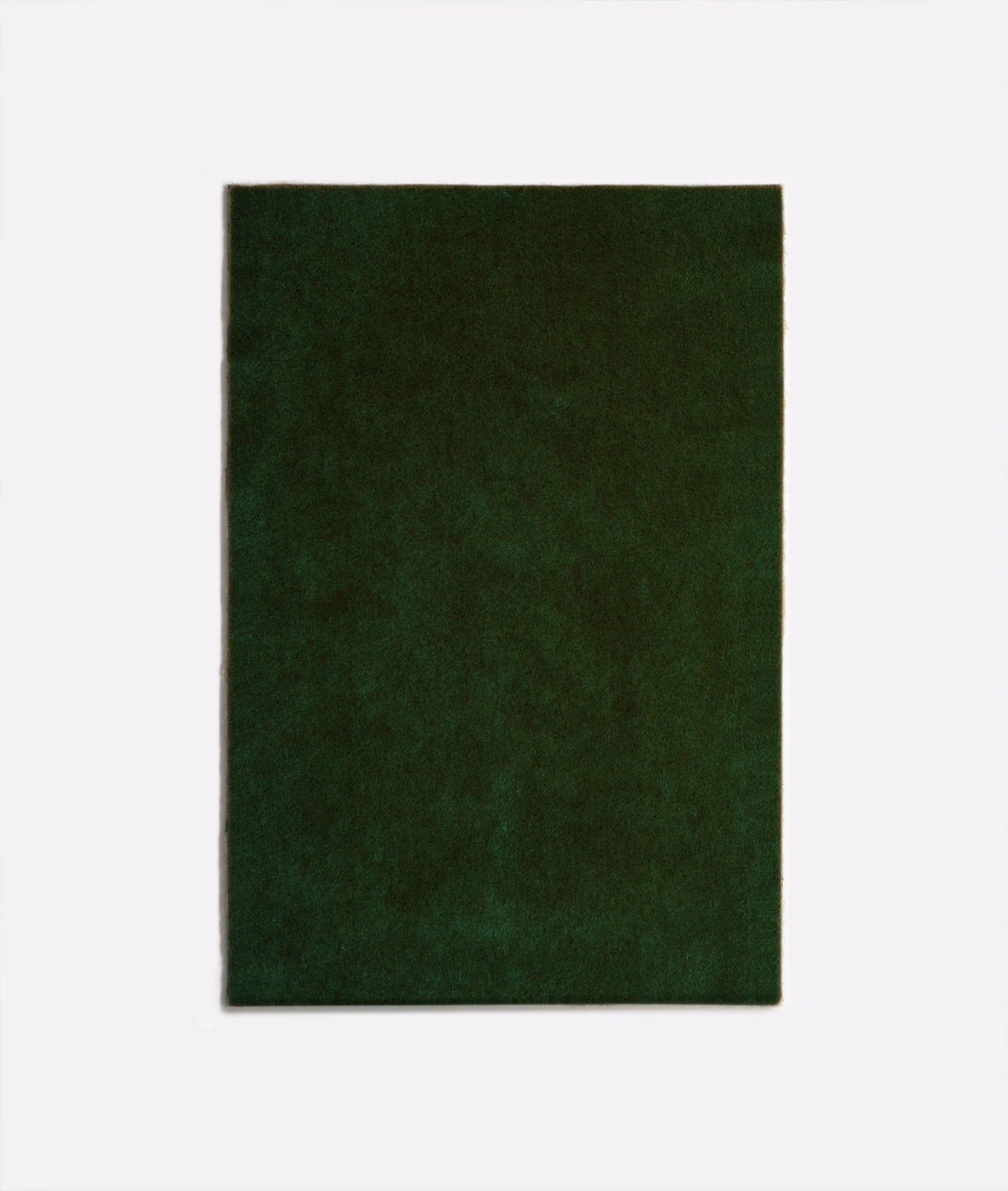 Deep bottiglia green velvet with softly mottled nap and subtle light-catching sheen