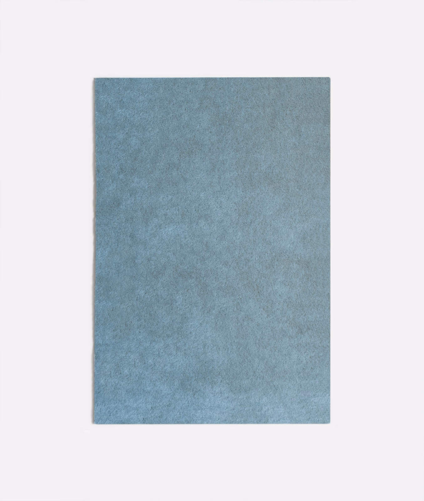 Mottled cool denim-blue velvet with a soft, cloudy surface