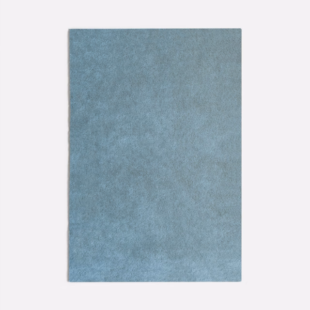 Mottled cool denim-blue velvet with a soft, cloudy surface