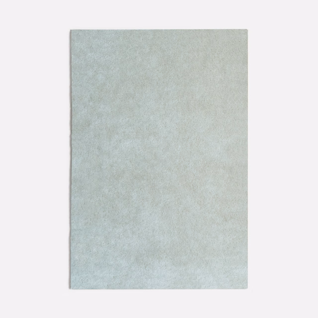 Pale ice-blue velvet swatch with softly mottled, frosted nap and subtle blue-grey shading