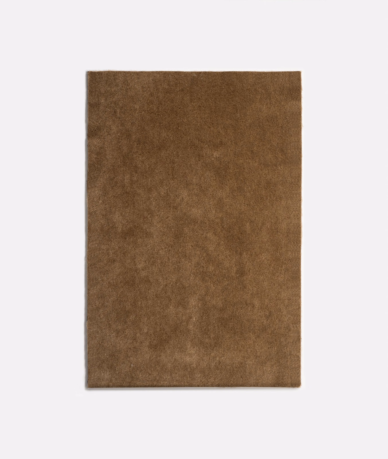 Warm tobacco-brown velvet swatch with softly mottled nap and subtle directional sheen