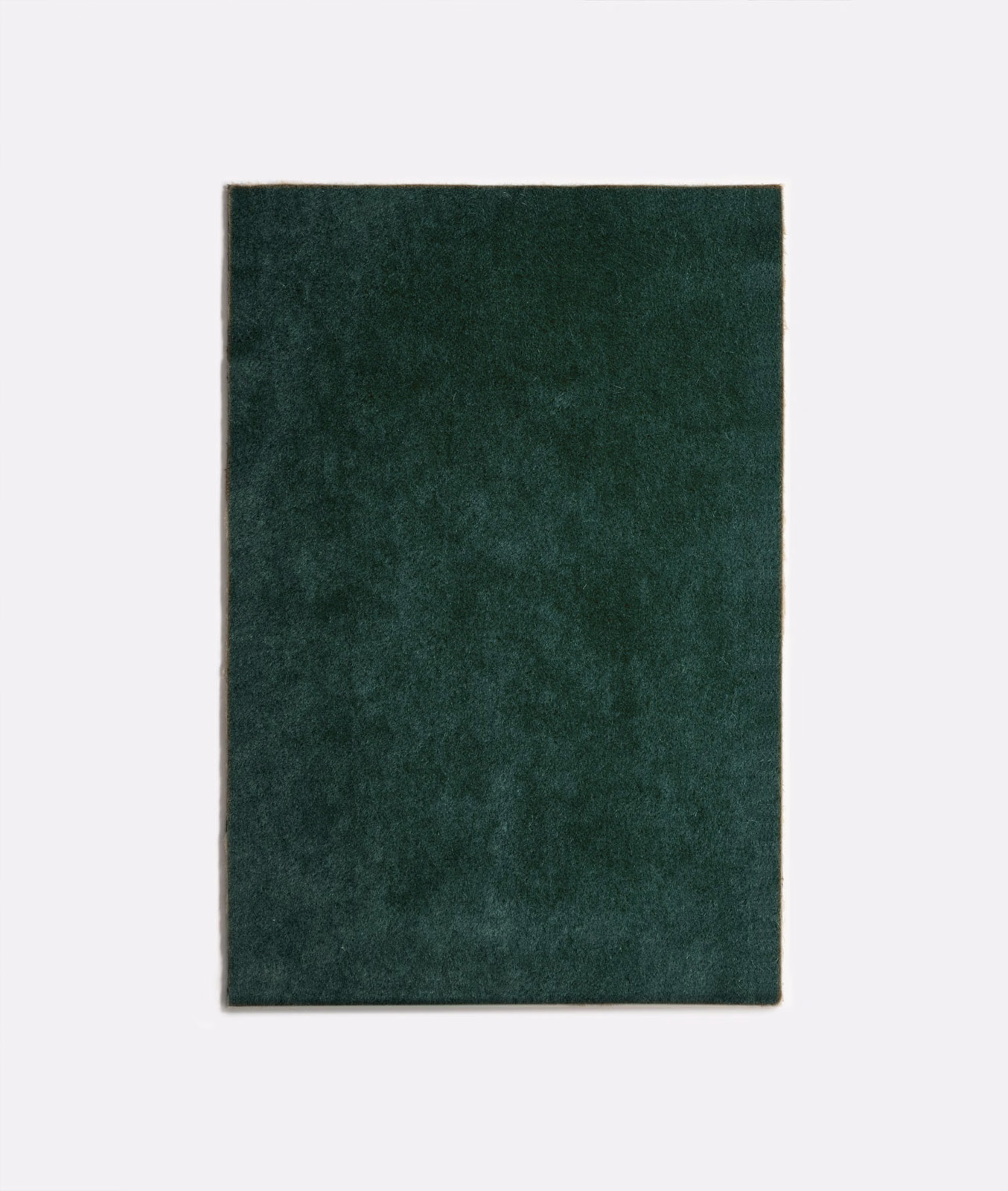 Dark petrol-green velvet swatch with soft nap variation and subtle mottled shading