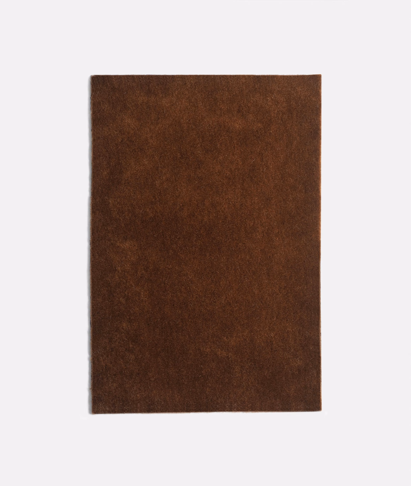 Deep tobacco-brown velvet swatch with a softly mottled, light-catching pile