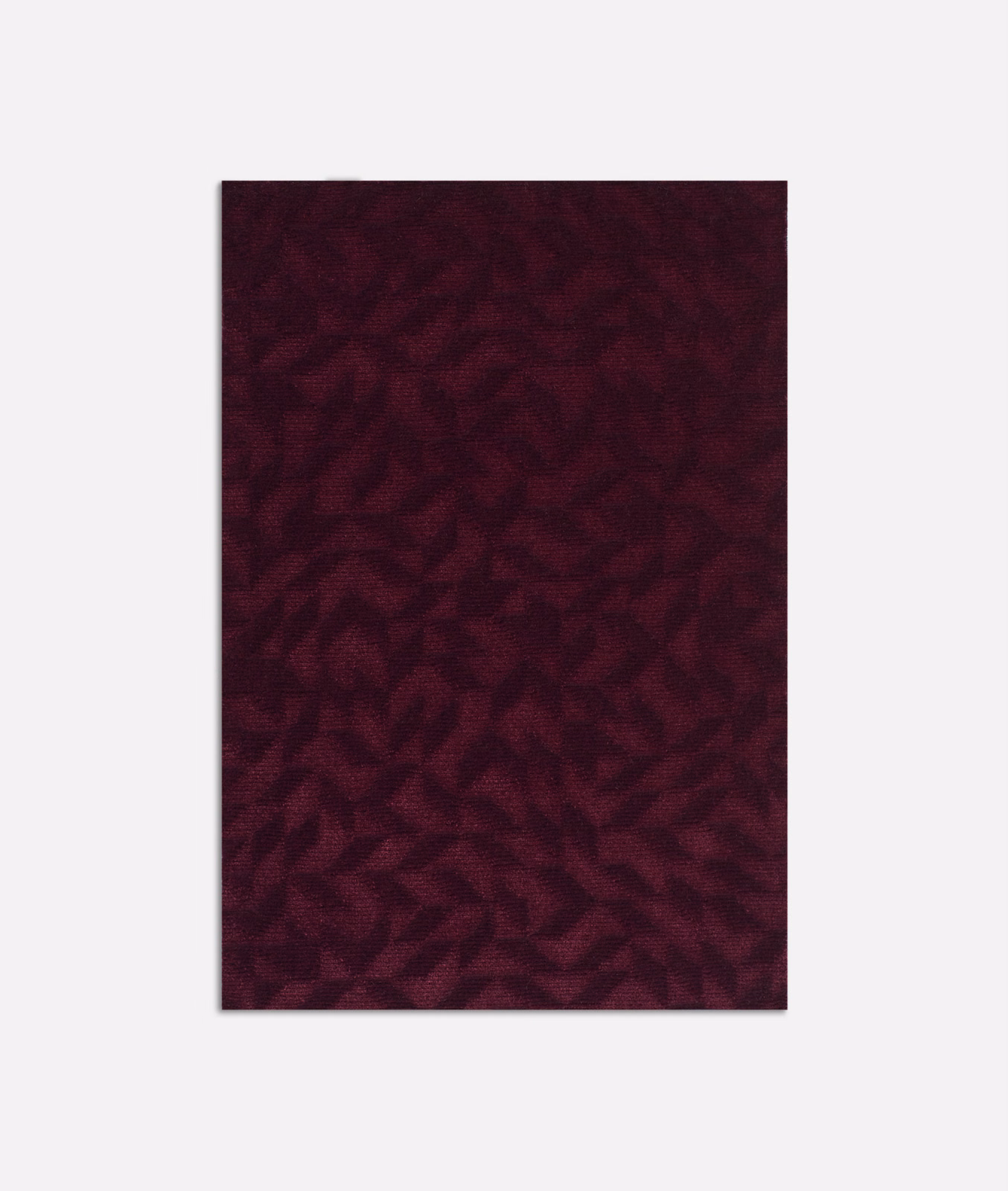 Deep bordeaux velvet with shadowed, irregular organic marks and directional pile