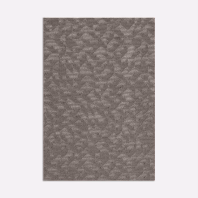 Smoky ash-grey velvet with overlapping tonal leaf-like motifs and a soft pile.