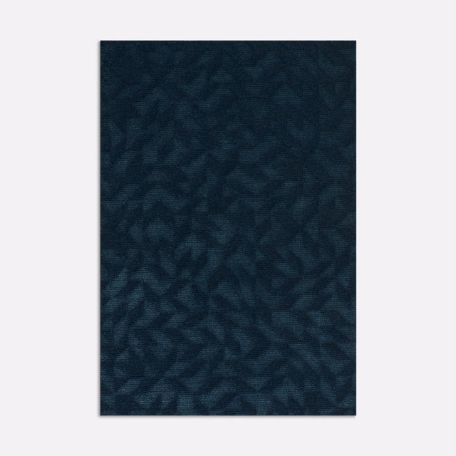 Deep denim velvet with shadowy blue-black angular organic pattern and subtle texture