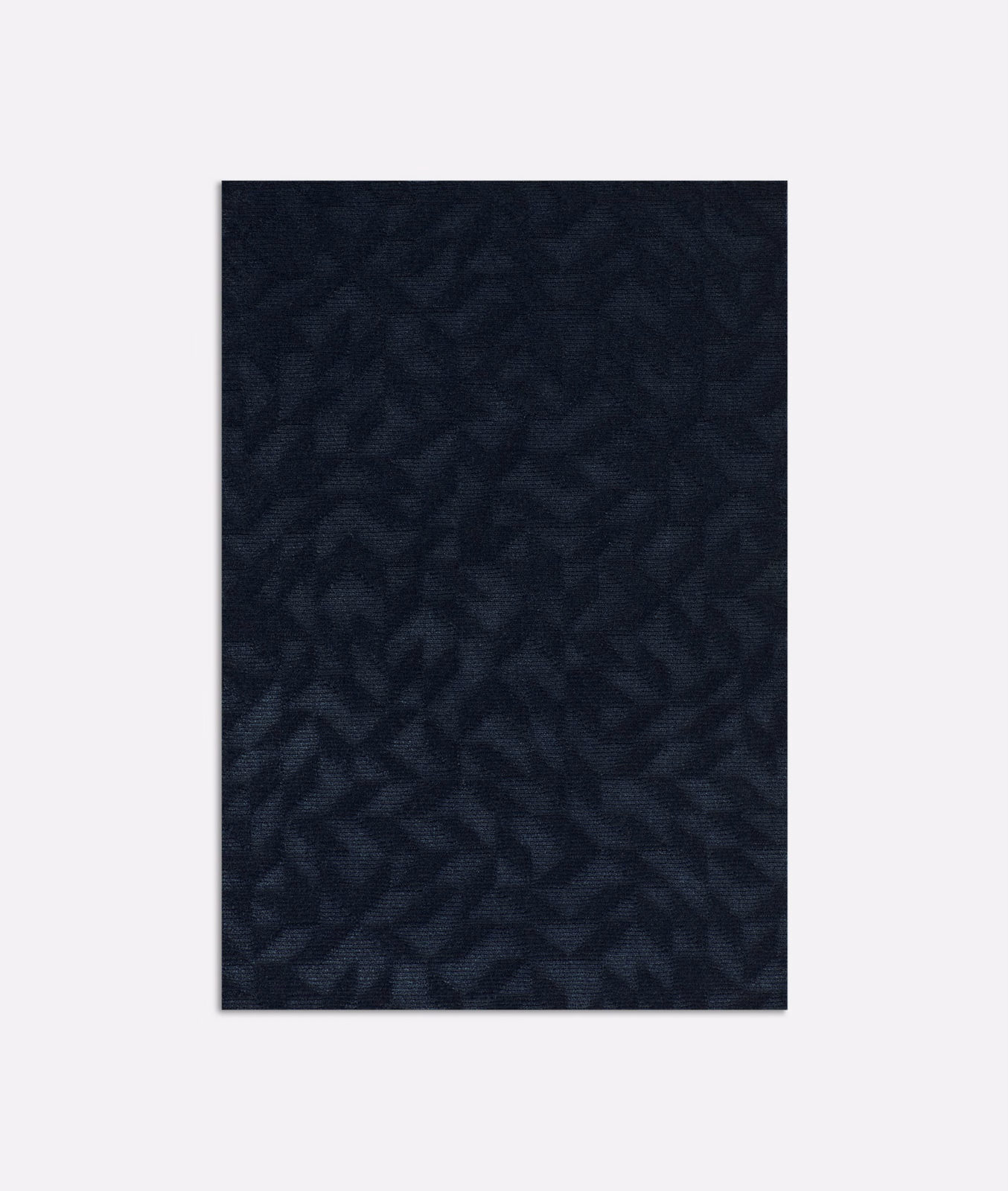 Deep ink-blue velvet swatch with subtle shadowed leaf shapes and low sheen