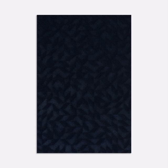 Deep midnight navy velvet with subtle faceted geometric pattern and low sheen