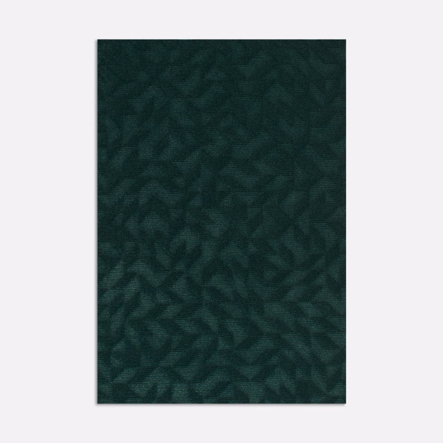 Deep pine-green velvet with a shadowy angular leaf-like pattern and subtle sheen