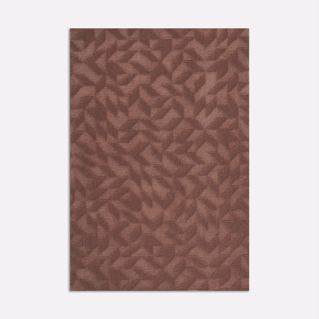 Warm terra cotta velvet with dense rust-brown geometric leaf-like motifs and subtle directional sheen