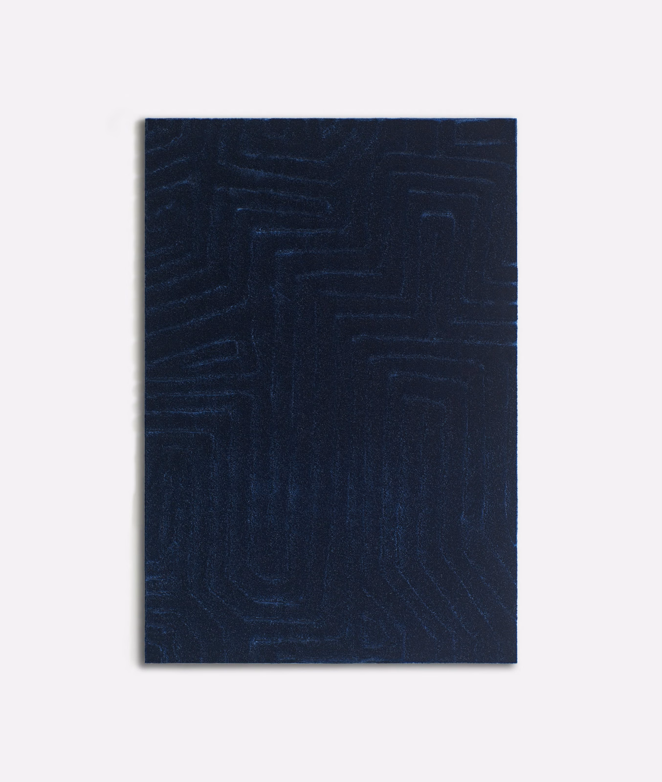 Midnight navy velvet with subtle tonal maze-like geometric lines and a soft directional sheen