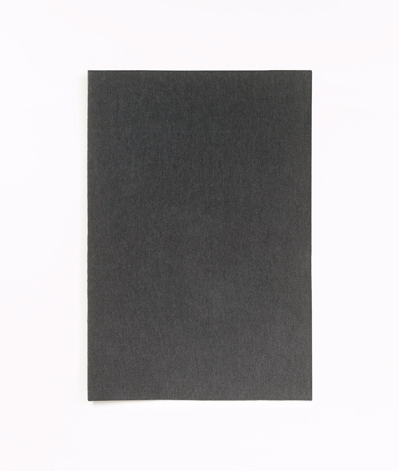Dark anthracite velvet swatch showing a soft, subtly varied light-catching nap