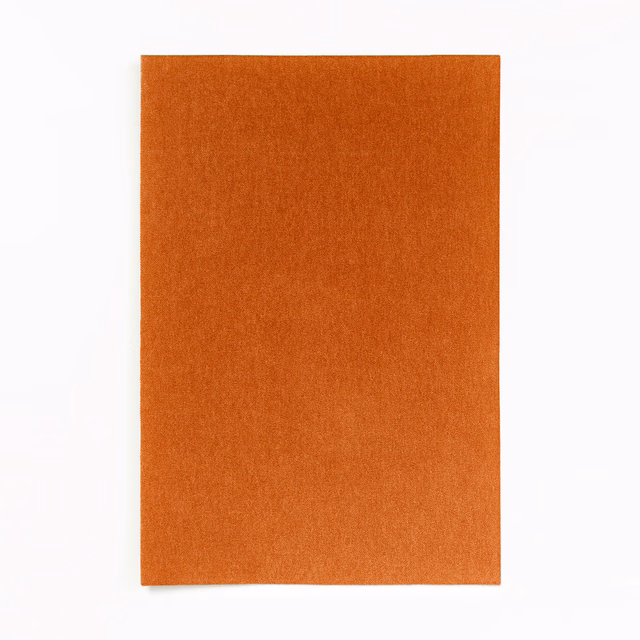 Rectangular burnt-orange velvet swatch showing close nap and subtle copper sheen