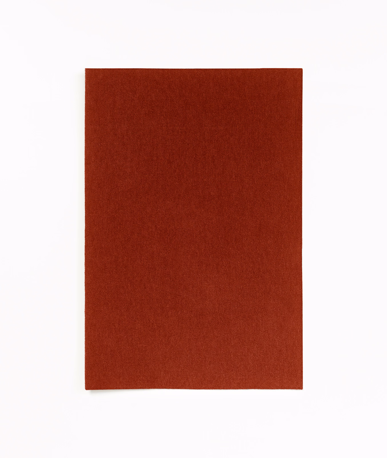 Deep Bordeaux-red velvet swatch showing a plain, softly shifting low-pile surface