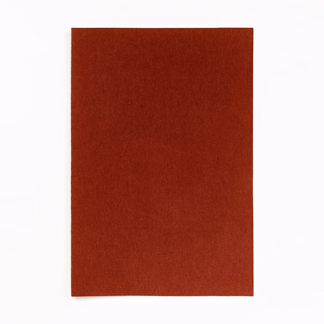 Deep Bordeaux-red velvet swatch showing a plain, softly shifting low-pile surface