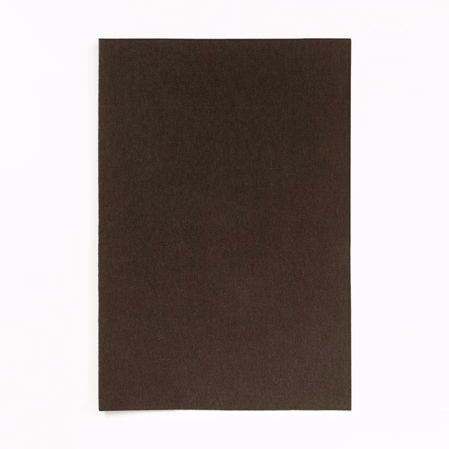 Deep ebony-brown velvet swatch with a subtle, light-catching nap