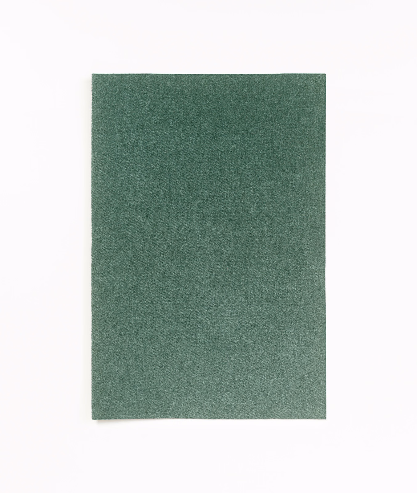 Muted mineral-green velvet with a softly mottled nap and gentle light variation