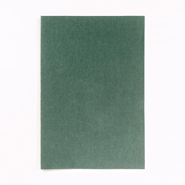 Muted mineral-green velvet with a softly mottled nap and gentle light variation