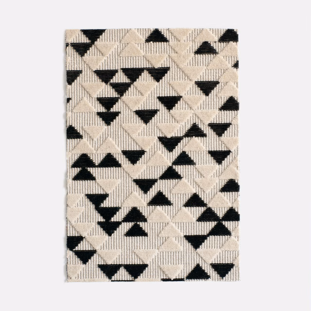 Charcoal and ivory velvet with layered black triangular geometric motifs