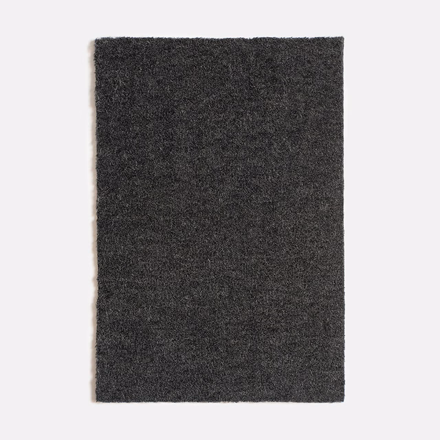 Deep charcoal-black velvet swatch showing a softly mottled, tactile pile