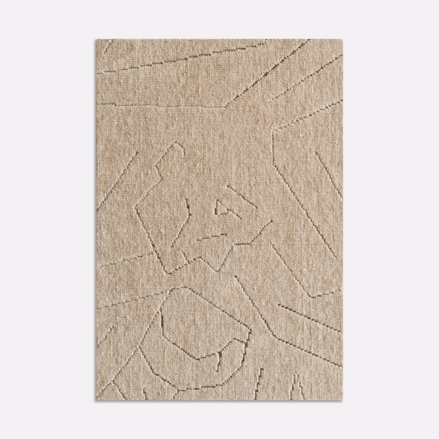 Warm stone-beige velvet with faint abstract outlined shapes and a softly brushed texture