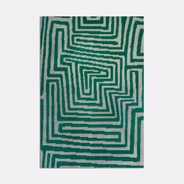 Emerald green labyrinth lines on an ivory, softly textured velvet swatch