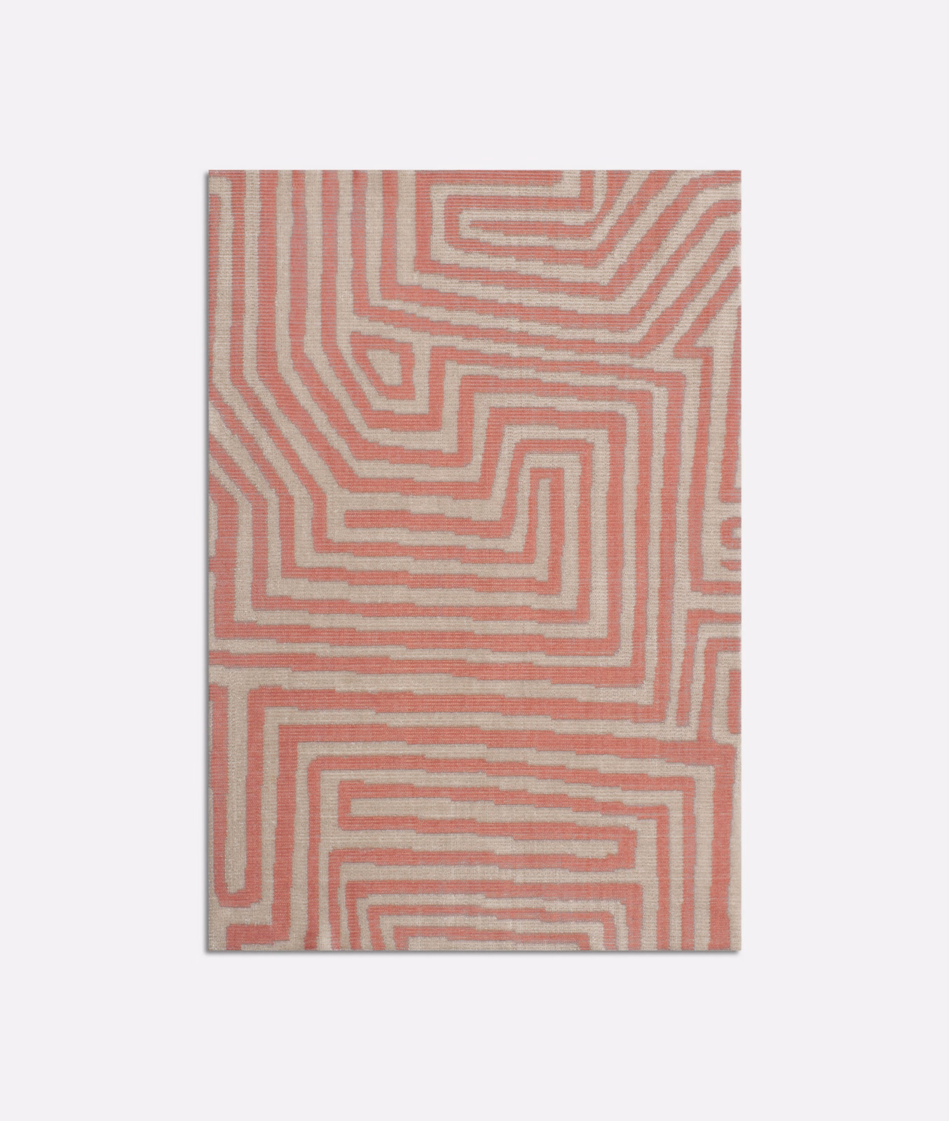 Dusty flamingo pink velvet with cream maze lines and a softly textured surface