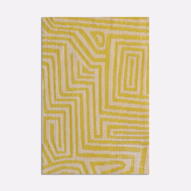 Chartreuse and ivory velvet with a tactile maze-like geometric pattern