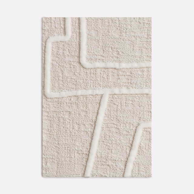 Soft ivory velvet with raised angular lines and a finely textured pile