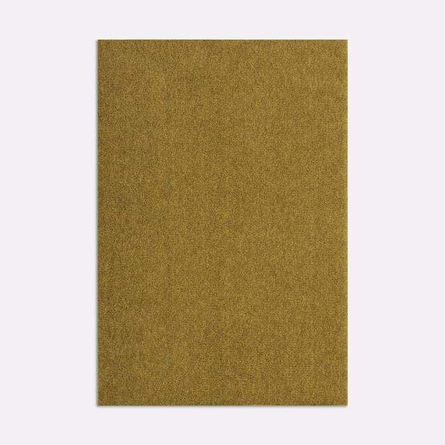Muted ochre-gold velvet swatch with fine nap and softly mottled olive-brown shading
