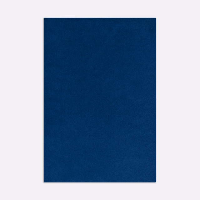 Deep cobalt blue velvet swatch showing a softly shifting, plain nap