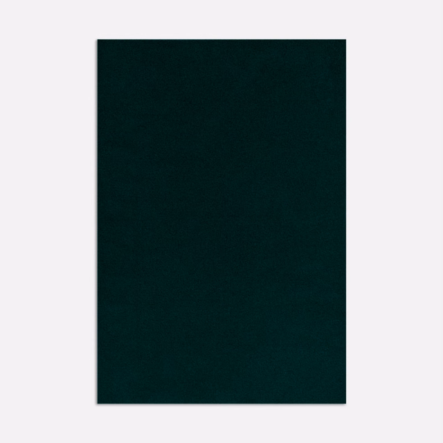 Dark forest-green velvet swatch showing a plain surface and subtle directional pile sheen