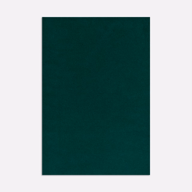 Deep malachite-green velvet with a softly visible directional pile