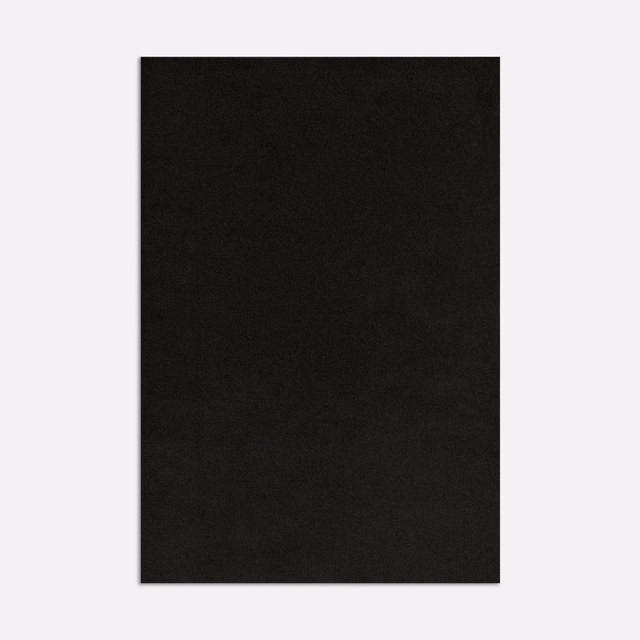 Near-black velvet swatch with subtle directional nap and soft tonal sheen