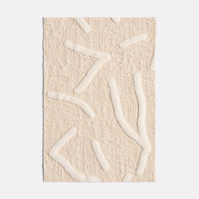 Bianco Polare velvet swatch with raised ivory lines over a pale cream ground